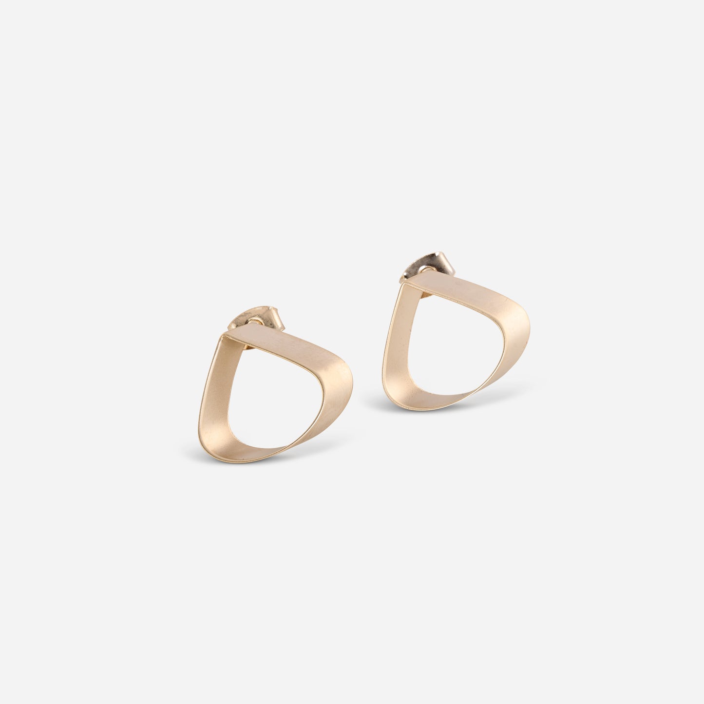 Triangle stud earrings in matte gold can be a stylish and modern choice.