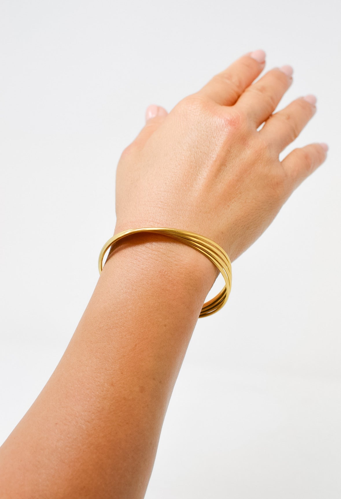 simply sophisticated and timeless,  gold bangle jewelry 